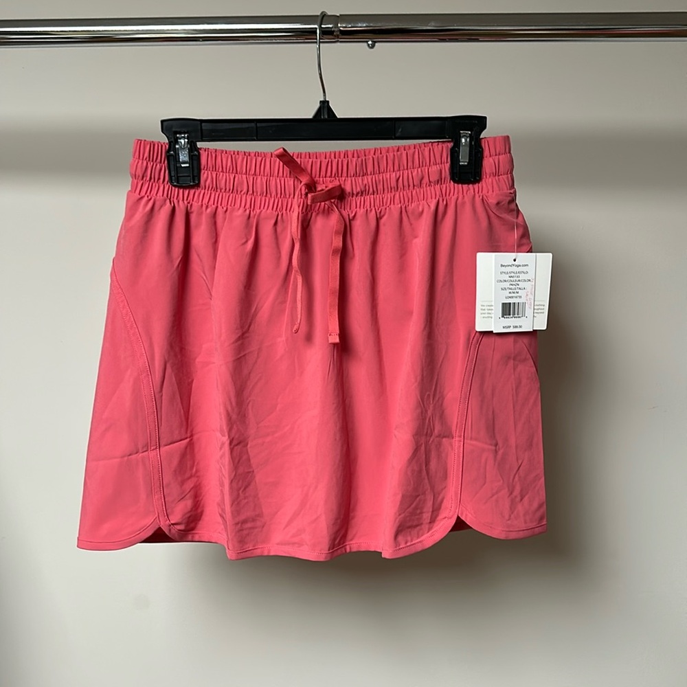 Beyond yoga in stride lined skirt pink horizon